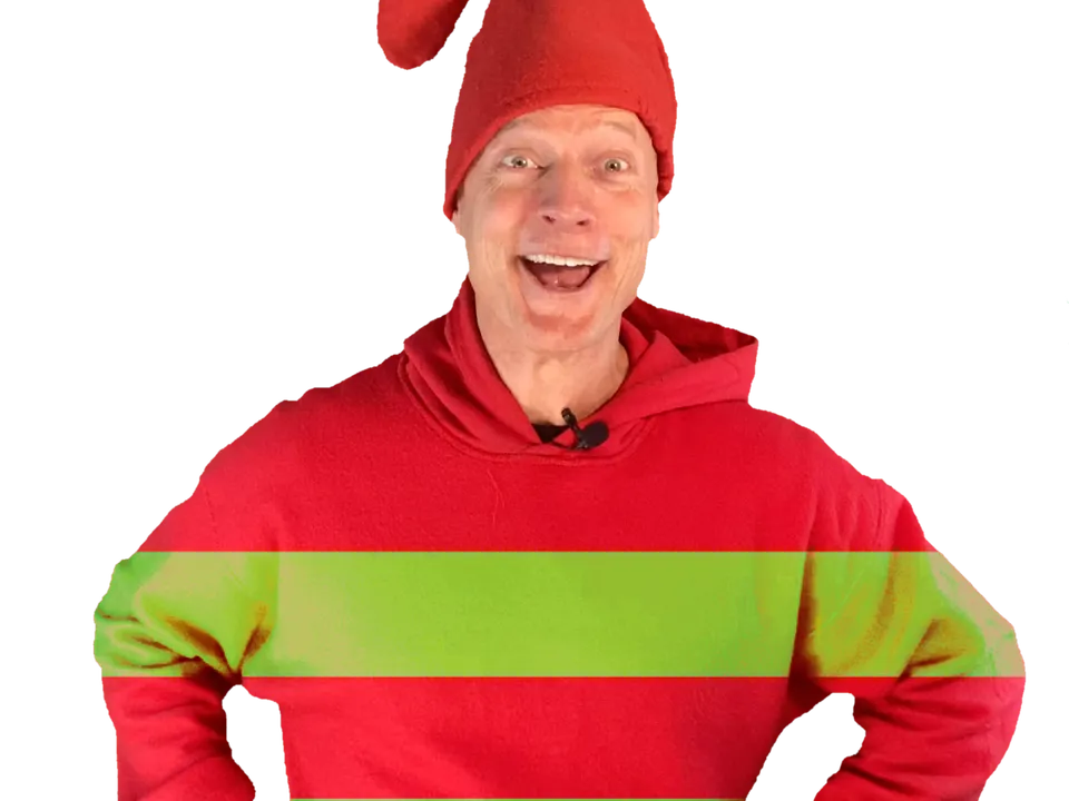 Actor de Chameleon Theatre caracterizado de elfo navideño para una función en inglés